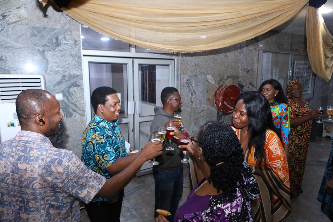 Guests toasting near the entrance