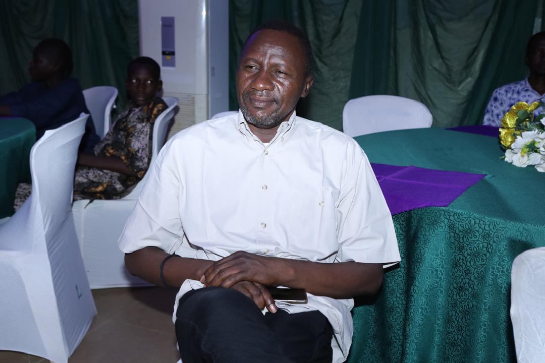 A delegate seated at a dinner table