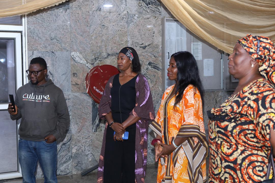 Attendees standing together in conversation